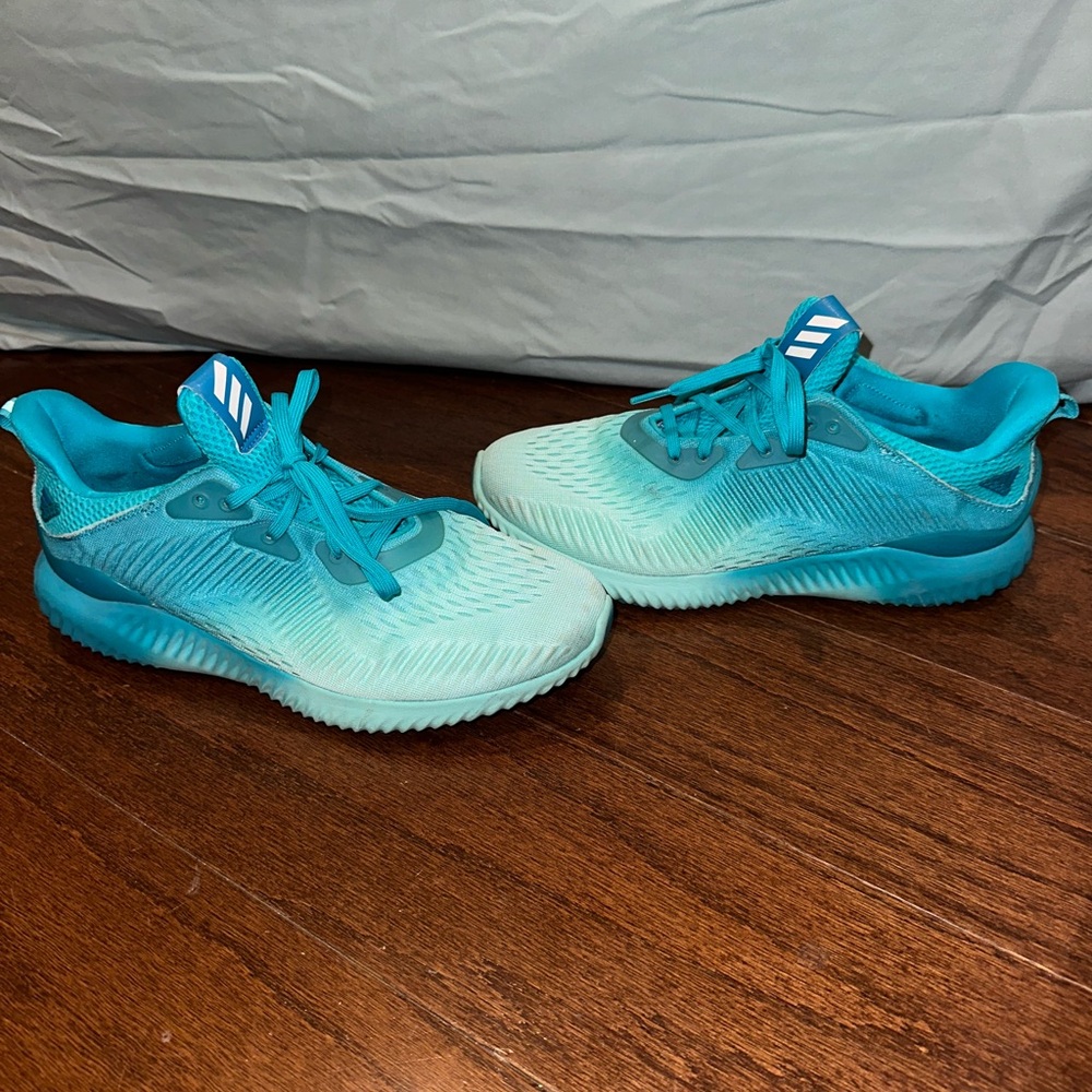 Women’s Adidas tennis shoes in blue